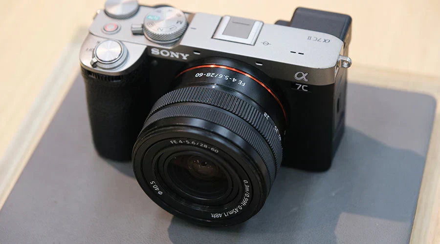 Mirrorless digital camera displayed for resale evaluation at PayMore Roswell