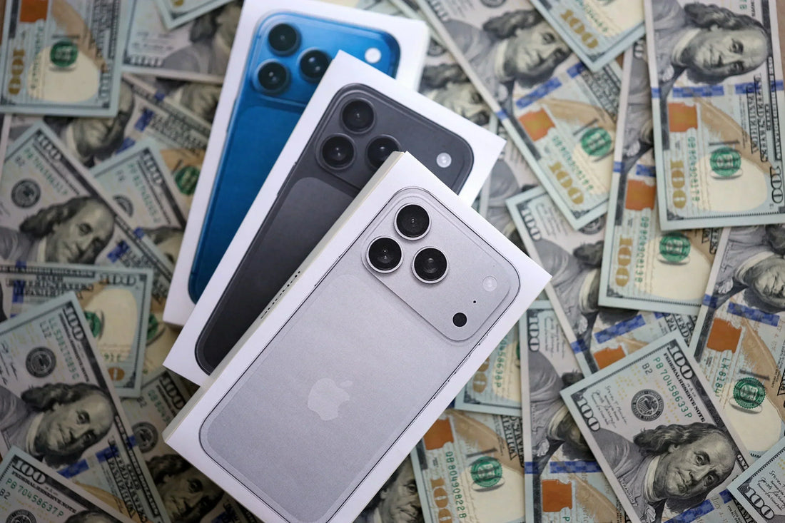 Assorted iPhone 11 and newer models displayed for resale at PayMore Roswell
